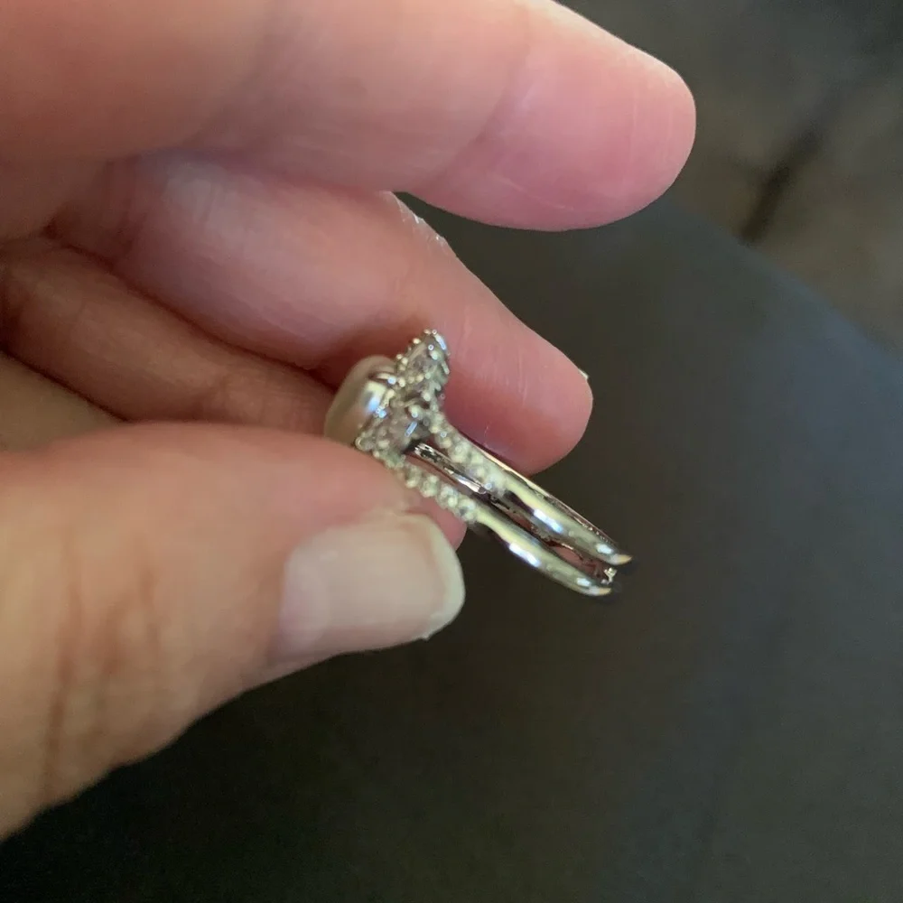 Silver tone teardrop shape faux pearl ring with crystals